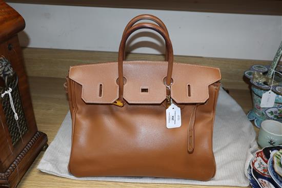 A Hermes tan leather Birkin handbag, with dust bag (puchased 1998 from Paris store) Width 35cm